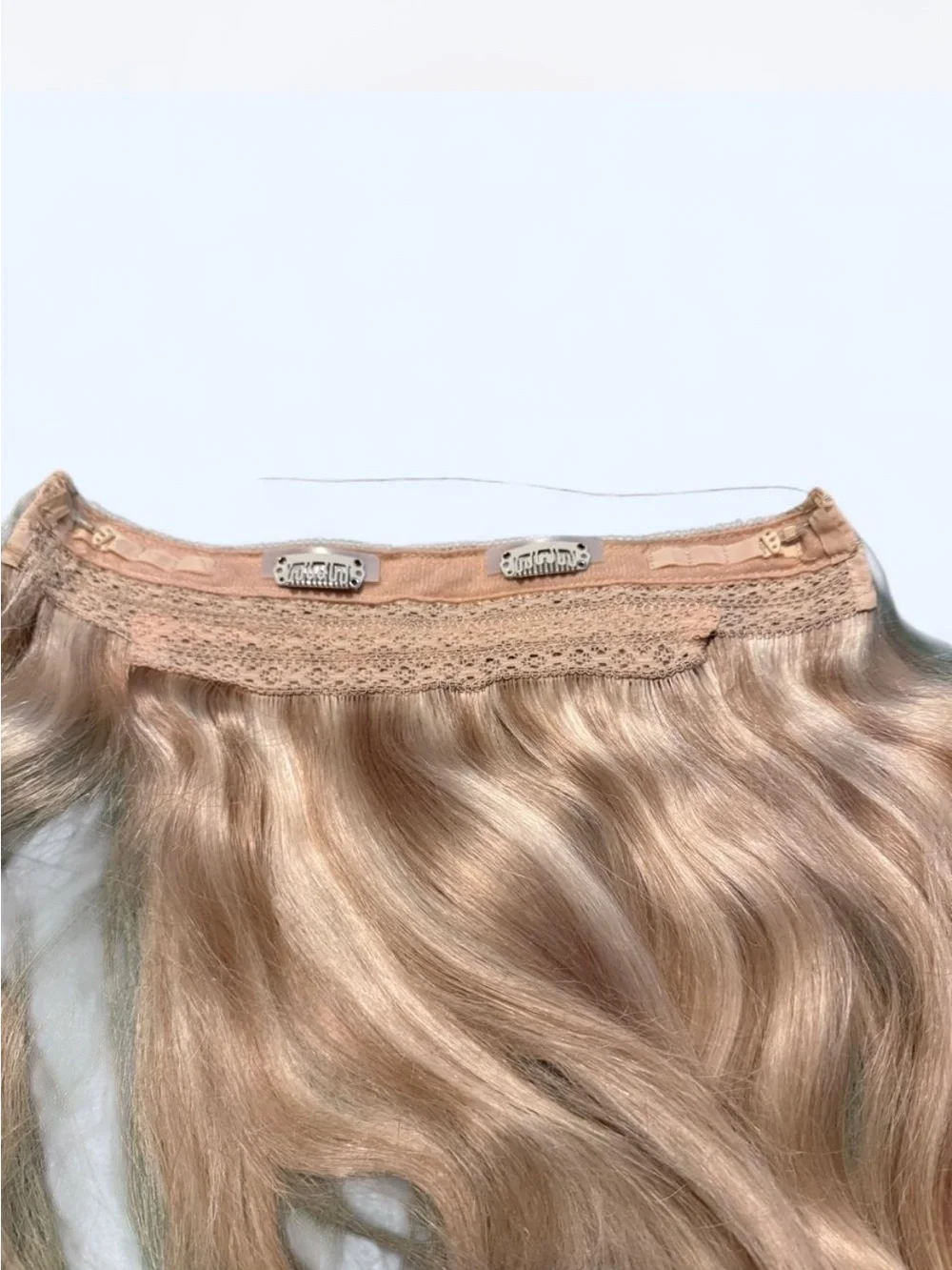Blonde Wavy Clip-In Extensions with Subtle Ombré Effect